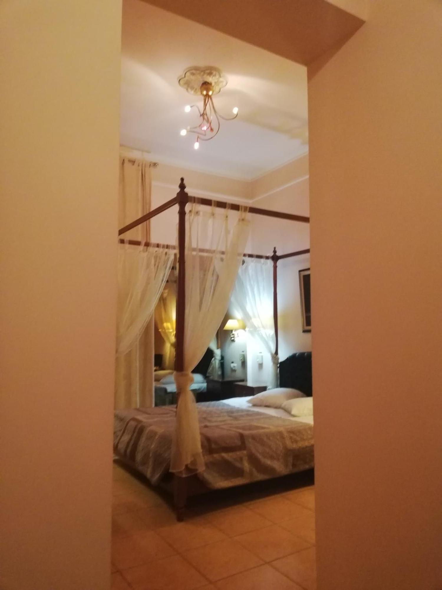 Exis Hotel Atenas Quarto foto